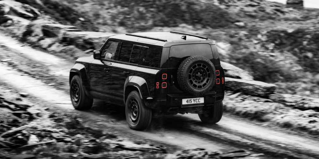Defender Octa Black Driving on Rugged Terrain