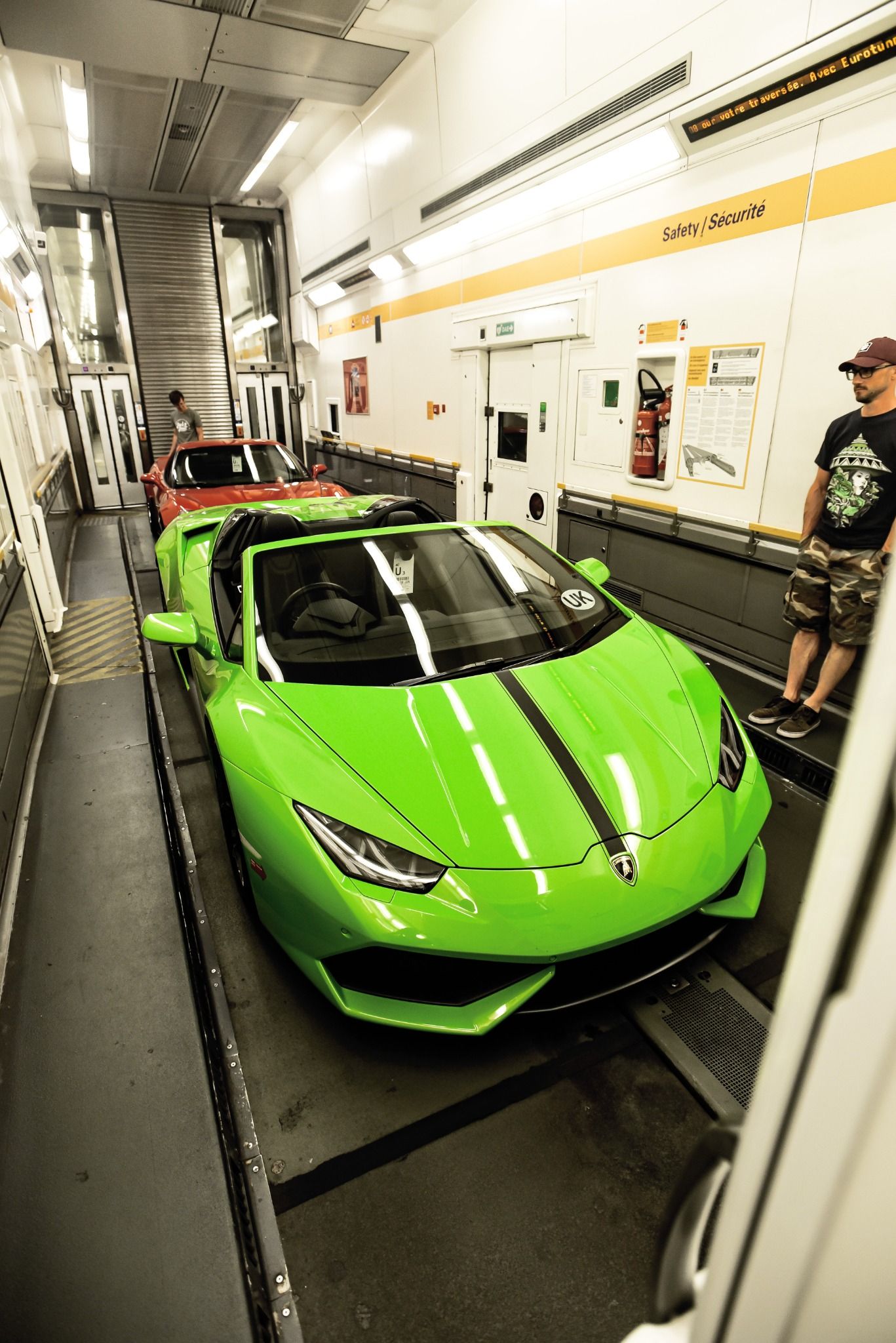 Green Lamborghini in a shipping container