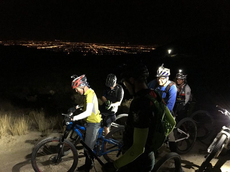 Cyclists riding in the dark