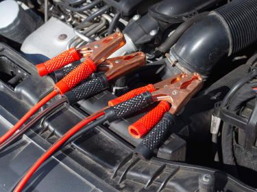 Jump cables on a car engines