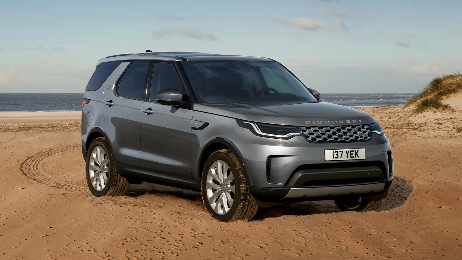 Silver Land Rover Discovery exterior side parked