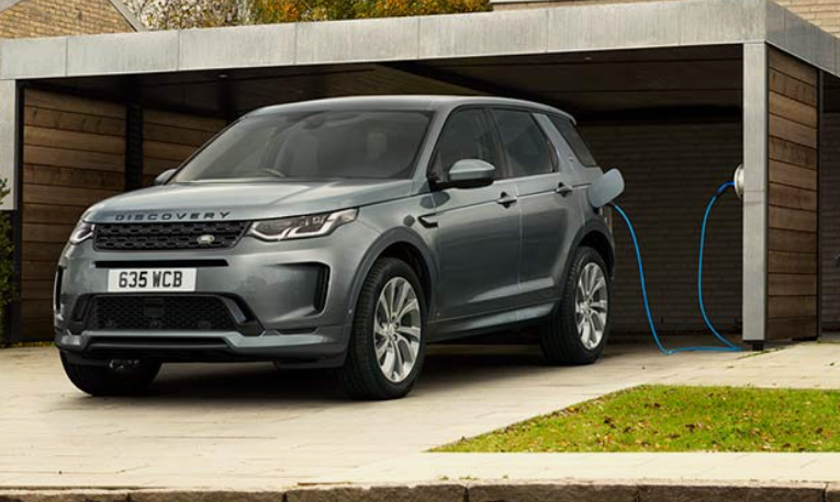 Grey Land Rover Discovery exterior charging