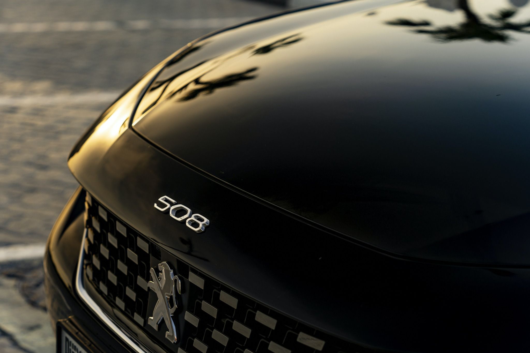 close up front peugeot 508 grill and bonnet
