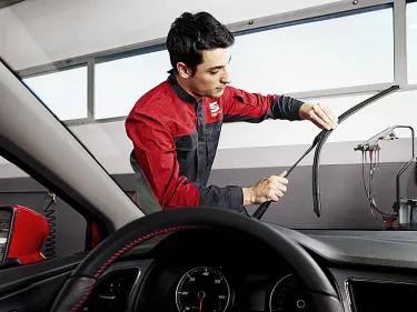 SEAT Technician working on a car