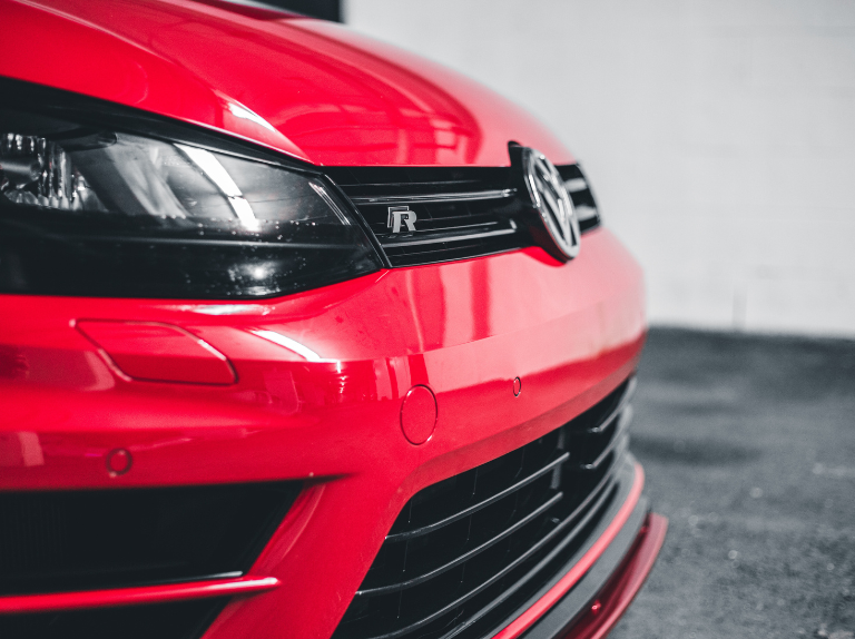 Close up of red Volkswagen Golf R bumper