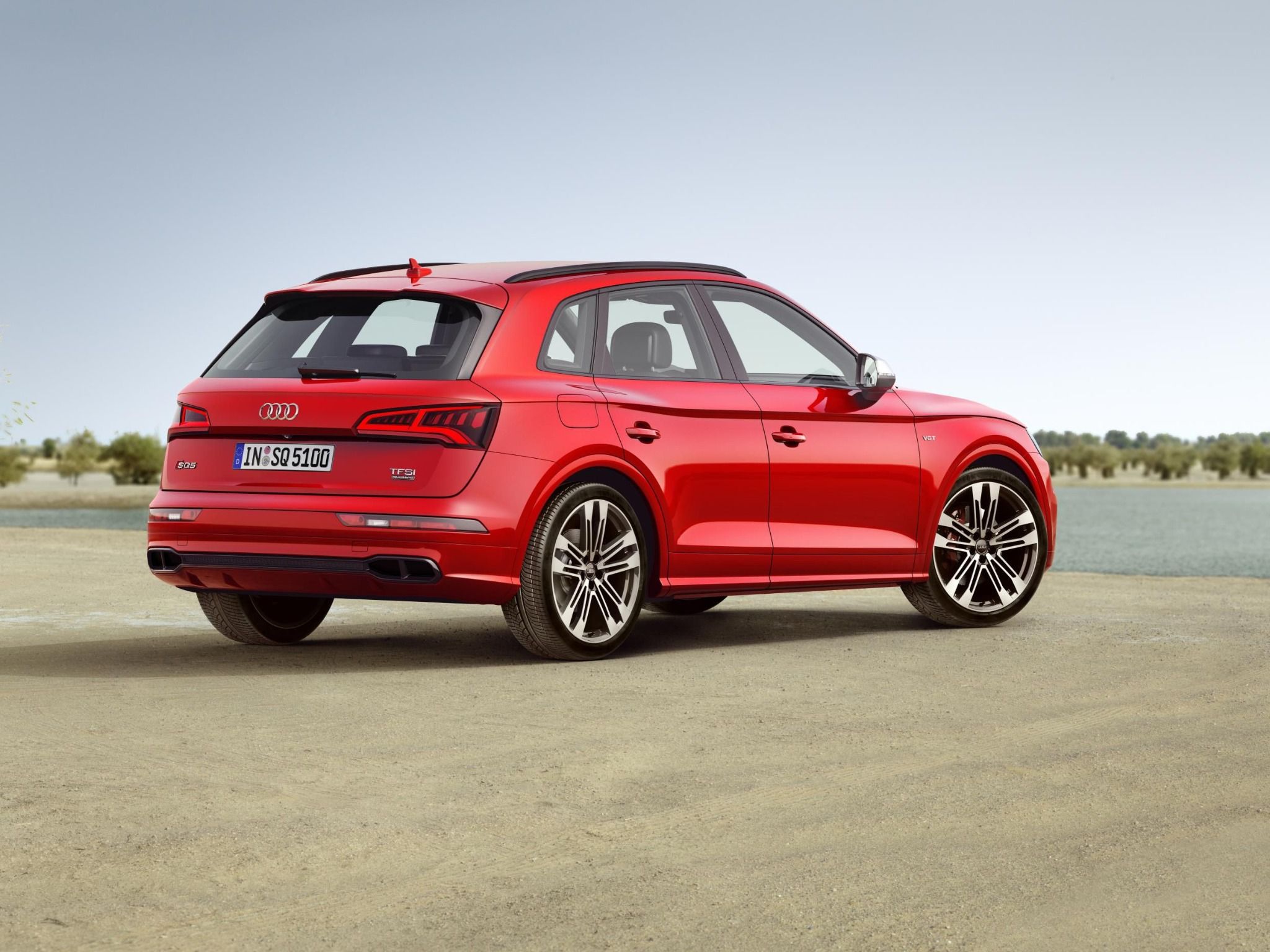 side rear view of red audi sq5