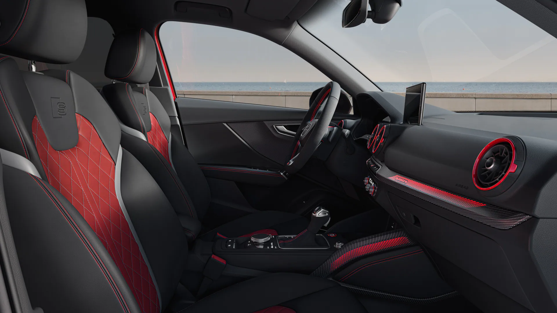 side view of audi sq2 interior with black and red leather