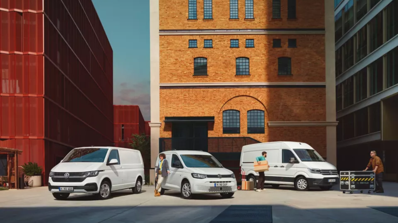 Volkswagen Crafter, Caddy and Transporter parked on a building site