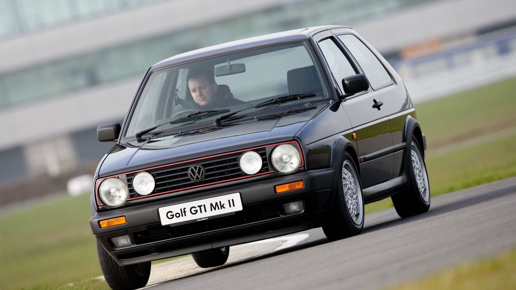 Front view of a black VW Golf GTI MkII