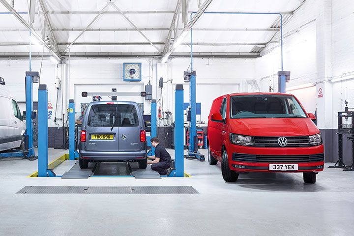 Volkswagen vans being serviced