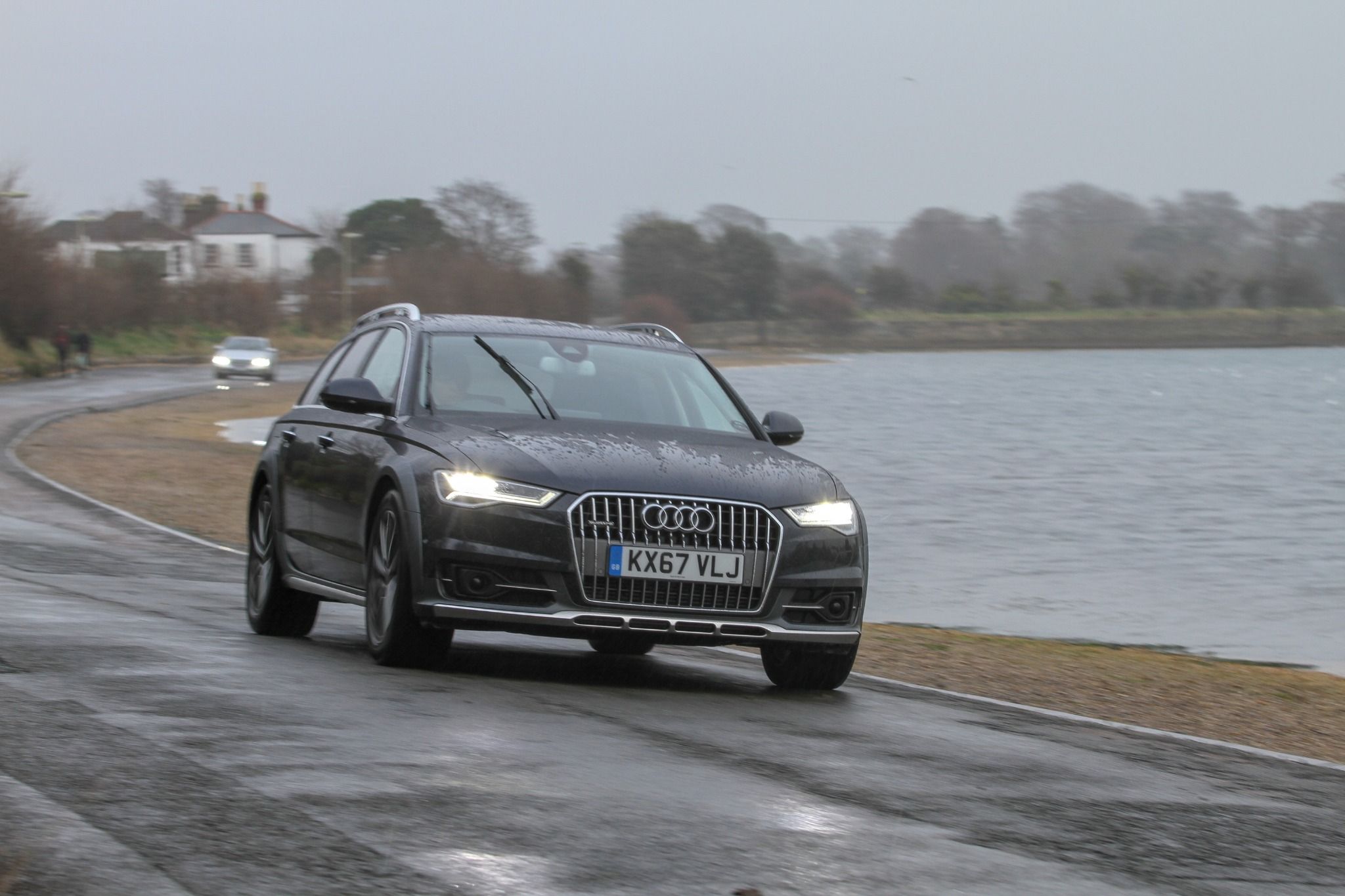 Audi A6 allroad driving down the road