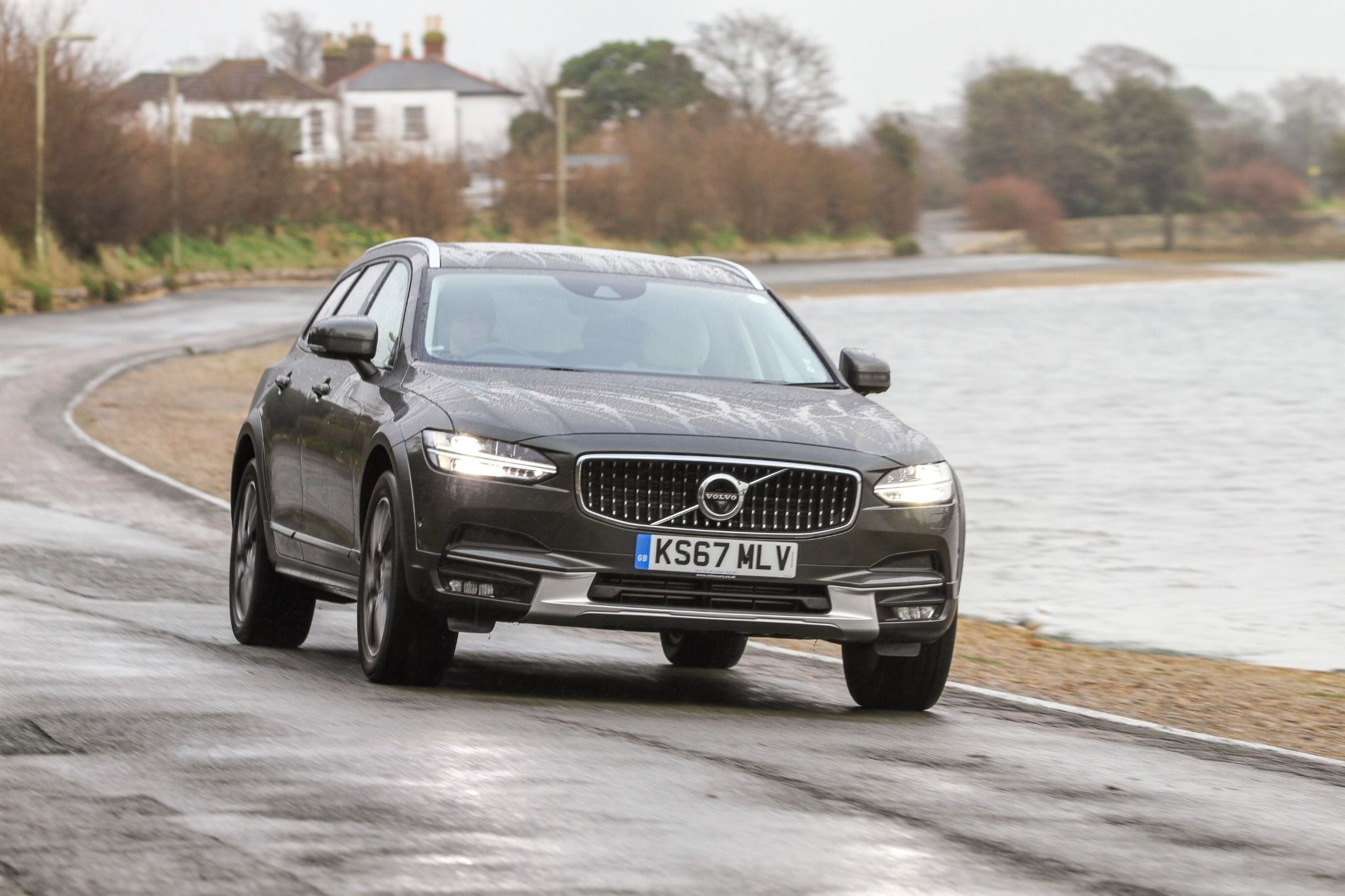 Volvo V90 driving down the road